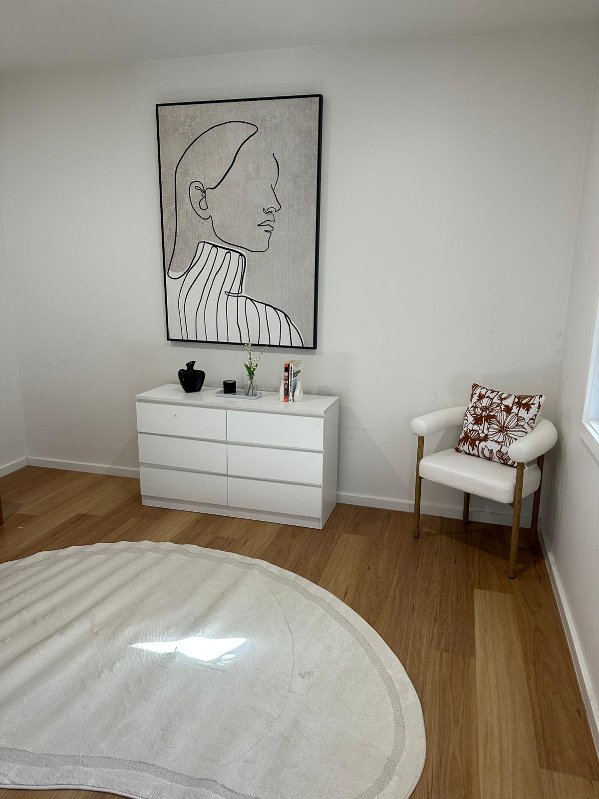 Staged dining area with simple table styling for an open home